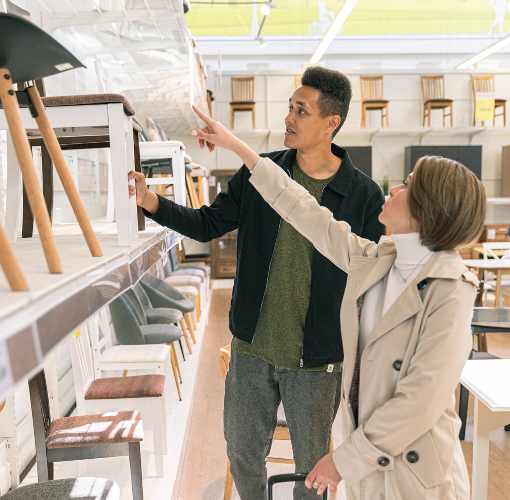 Man and woman shopping for furniture. Photo by Antoni Shkraba from Pexels.